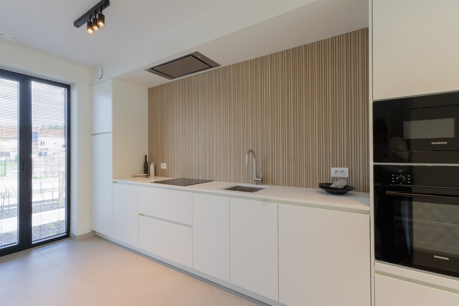 Volledig afgewerkte nieuwbouwwoning met 5 slaapkamers en 2 badkamers - foto 4
