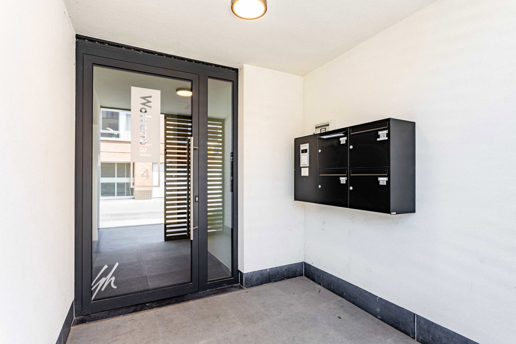 Instapklaar gelijkvloers appartement met 2 kamers en tuin - foto 4