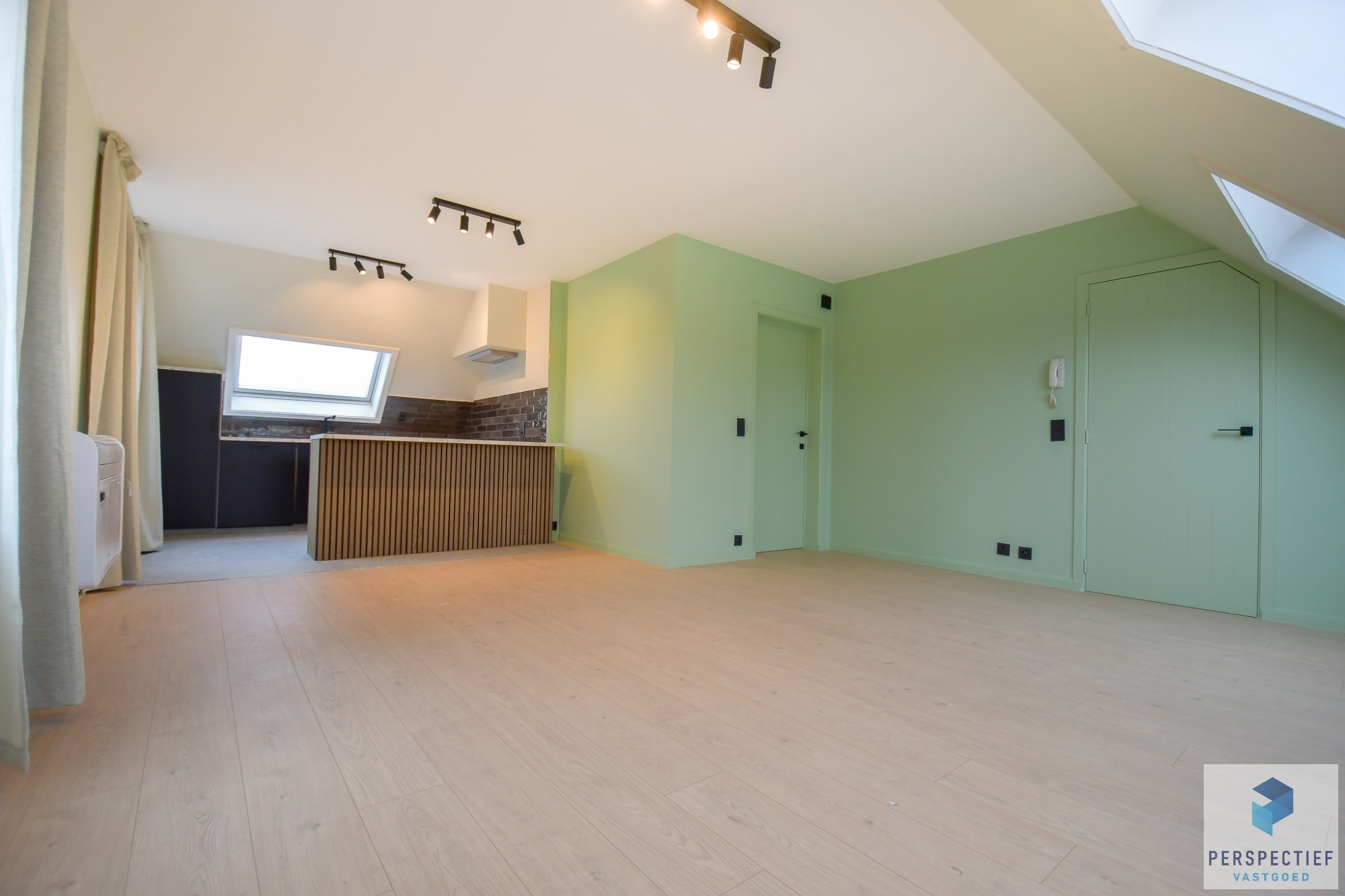 Centraal gelegen één-slaapkamerappartement met garage - foto 1