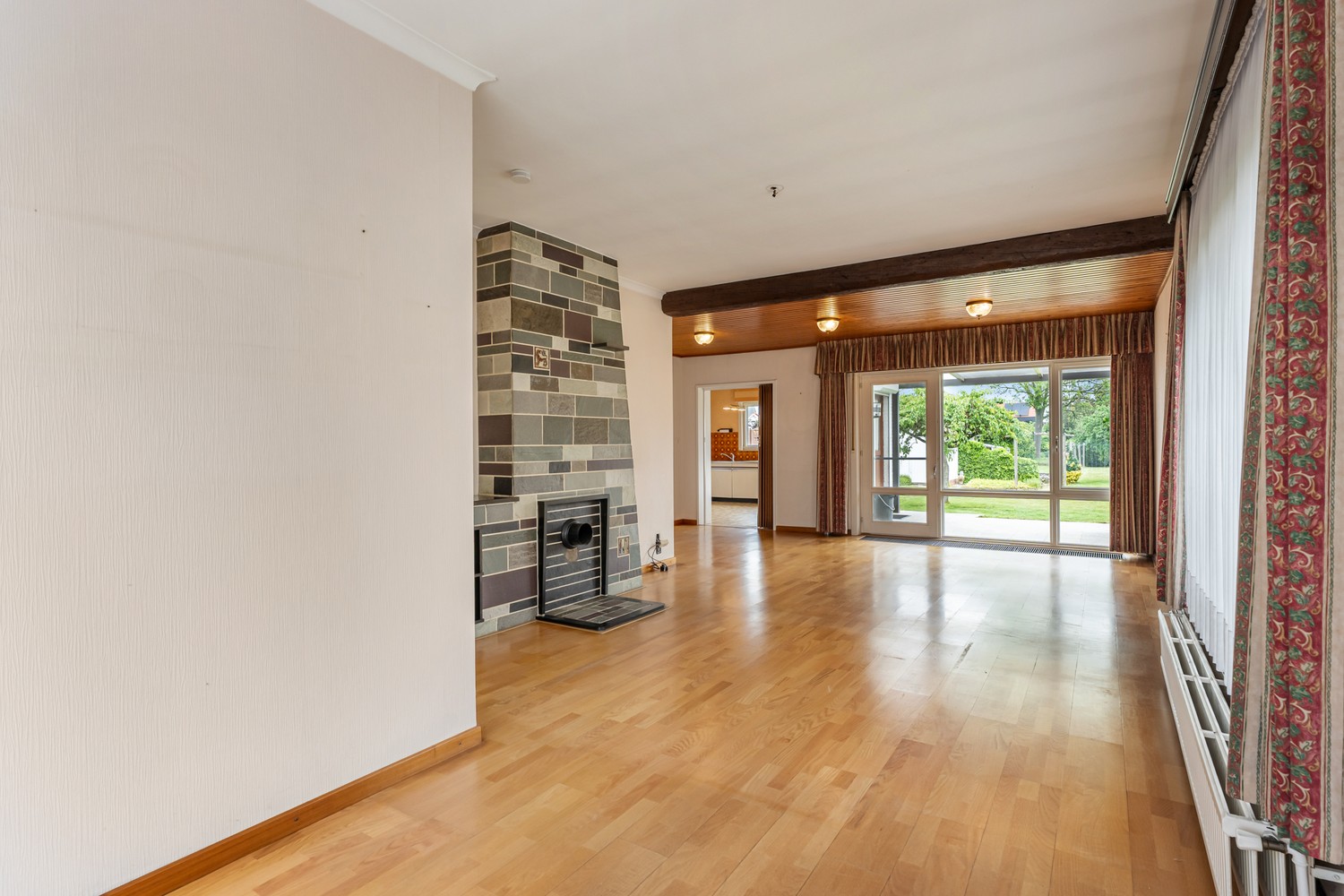 Goed gelegen woning met 4 slaapkamers, een garage en een diepe tuin in een verkeersluwe straat te Kessel-Lo! - foto 4