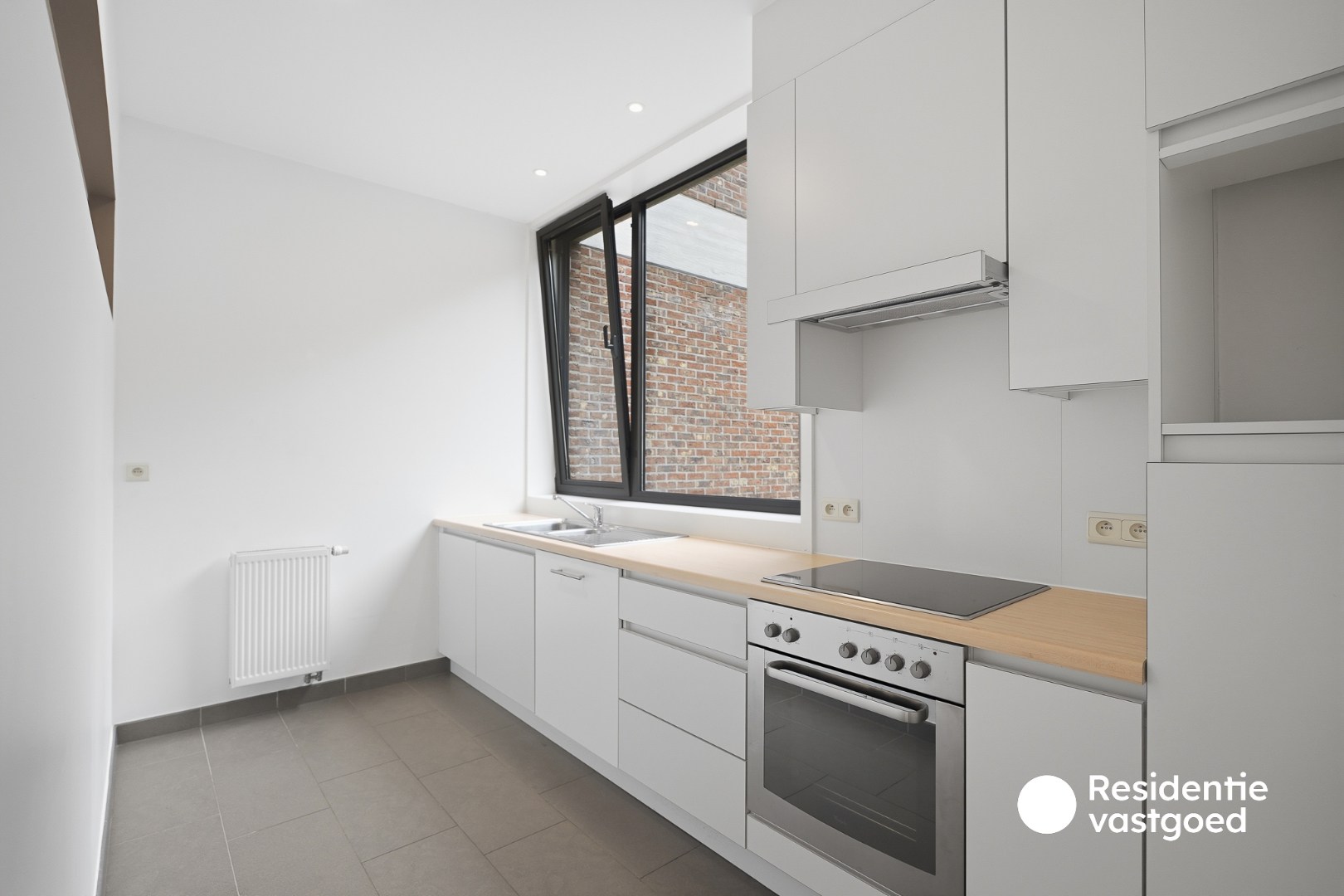 Ruim appartement met staanplaats en terras (46 m²!) aan het Koningin Astridpark - foto 5