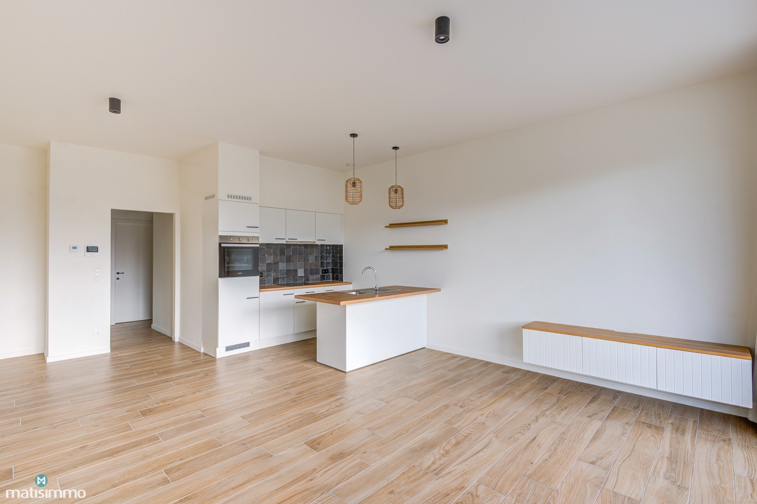 GELIJKSVLOERS APPARTEMENT MET ZUIDGERICHT TERRAS GELEGEN NABIJ HET CENTRUM VAN BILZEN - foto 5