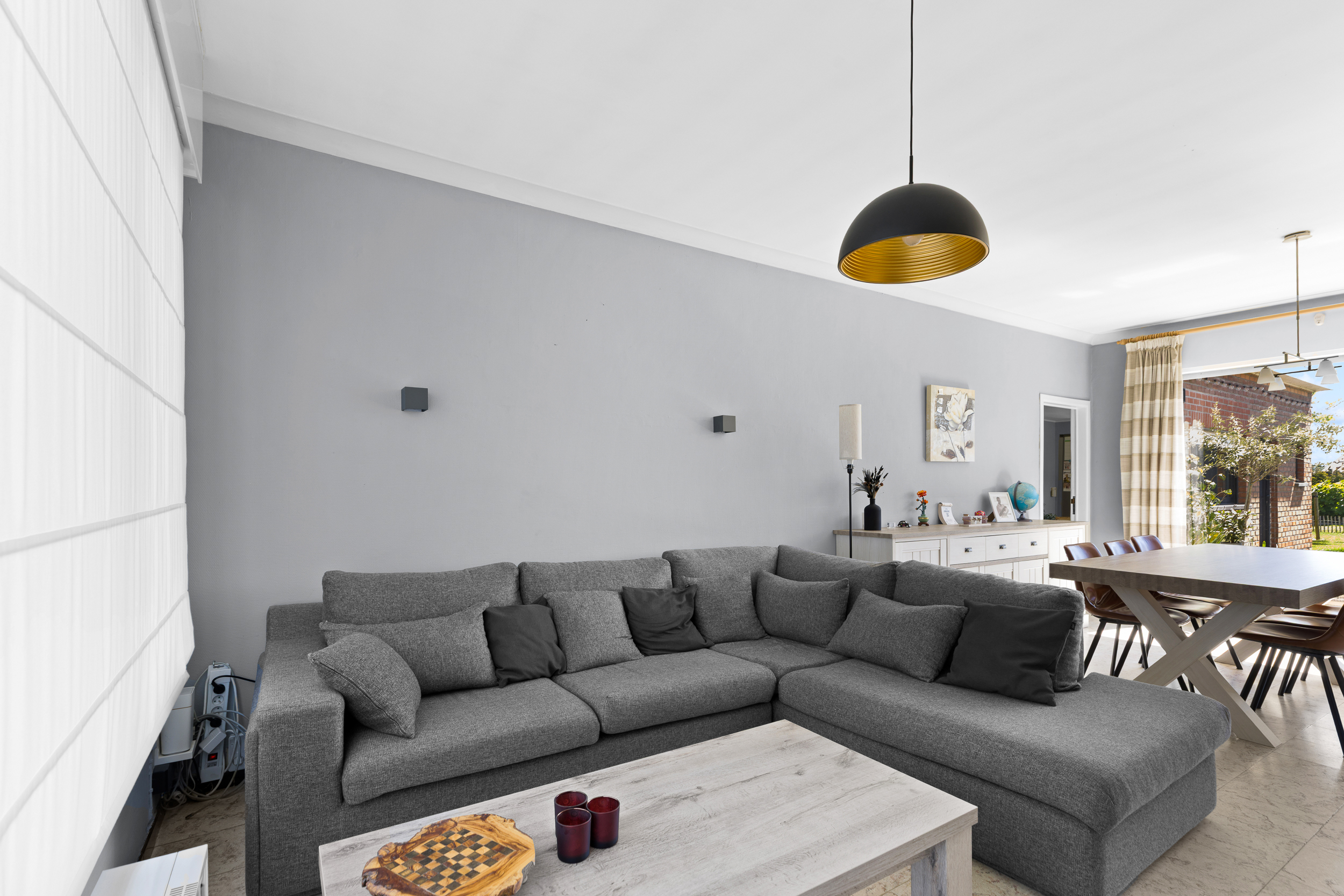 Gelijkvloers wonen met tuin en potentieel - foto 4