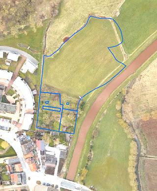 4 kadastrale percelen hooiland gelegen achter Karel Govaertstraat nr 51 en wegenis naar de grond rechts van nr 51 en links van de Grote Nete...