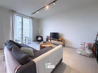 <p><span>Quality finished apartment located on the third floor in the Zuidkaai project. </span><span><br /><br /></span><span>The apartment is located near the center of Aalst. Apartment layout: entrance hall, storage/laundry, living room with open kitchen with island, hallway, toilet, 2 bedrooms, a bathroom with walk-in shower, and 2 terraces (14m² and 7m²) overlooking the Dender.</span></p><p><span>Basement: This apartment has a private parking space and storage + spacious bike parking with bike lift + waste area.<br /><br />In the nearby area, you will find all amenities, including shops, schools, public transport, catering, etc. From here you have easy access to various access roads as well as the E40.<br /><br />Strengths of the apartment:</span></p><ul><li><span>Quietly located with a view of the Dender.</span></li><li><span>Large windows throughout the apartment, very much natural light.</span></li><li><span>Apartment will be delivered painted</span></li><li><span>Heating via residual heat, cheaper than gas!</span></li><li><span>Underfloor heating</span></li><li><span>Solar panels</span></li></ul><p><span>Rent  per month: 1190€<br />Provision for common costs € 100 per month. <br /></span><span>For more info or a visit, contact Tiebe 0468 26 61 85</span></p><p><span>App B3.1 + Parking space 5 + storage 9 Kaaiman</span></p><p><span> </span></p>