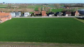 Strategically located along the Moorseelsesteenweg on the Vossemolen in Rumbeke, between house numbers 136 and 152 and near Beitem, is this subdivision with 5 spacious plots of land. The location combines easy accessibility via the N36 and E403 with the immediate vicinity of AZ Delta, Bergmolenbos, Sterrebos and the center of Rumbeke.LOT 4 is a plot of 1,649 m², suitable for the construction of an open building. With a street width of 20 meters and a depth of approximately 82 meters, this plot offers a spacious construction area of 14 meters wide and 22 meters deep. The west-facing garden enjoys afternoon and evening sun and borders the back of an agricultural zone with a permanent open view.According to regulations, up to 40% ancillary activities linked to living are possible, ideal for the office, practice, liberal profession or services. Thanks to its location, you can enjoy optimal visibility and accessibility.In addition, the following lots are available in this subdivision: Lot 1:1,661 m² | Lot 2:1,698 m² | Lot 3:1,674 m² | Lot 4:1,649 m² | Lot 5:2,176 m².A unique opportunity to build in a spacious and future-oriented way at a strategic location. You will soon be living here easily accessible and with a permanently open feeling thanks to the unobstructed rear view.