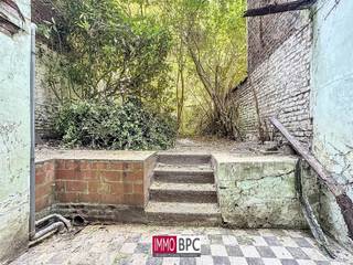 Welcome to this characterful mansion in the heart of Anderlecht, a magnificent example of authentic Brussels architecture from the late 19th...