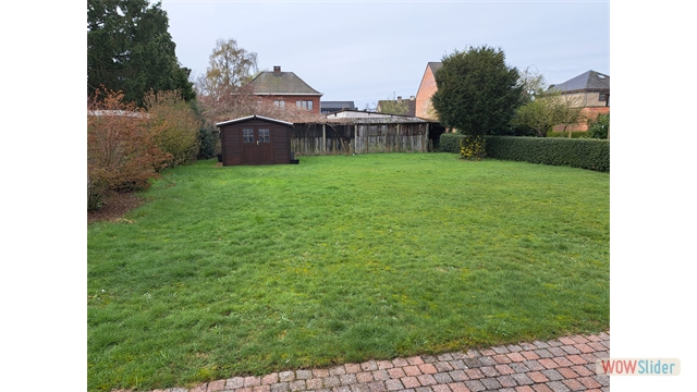 Een vrijstaande woning met tuin en inpandige garage - foto 4