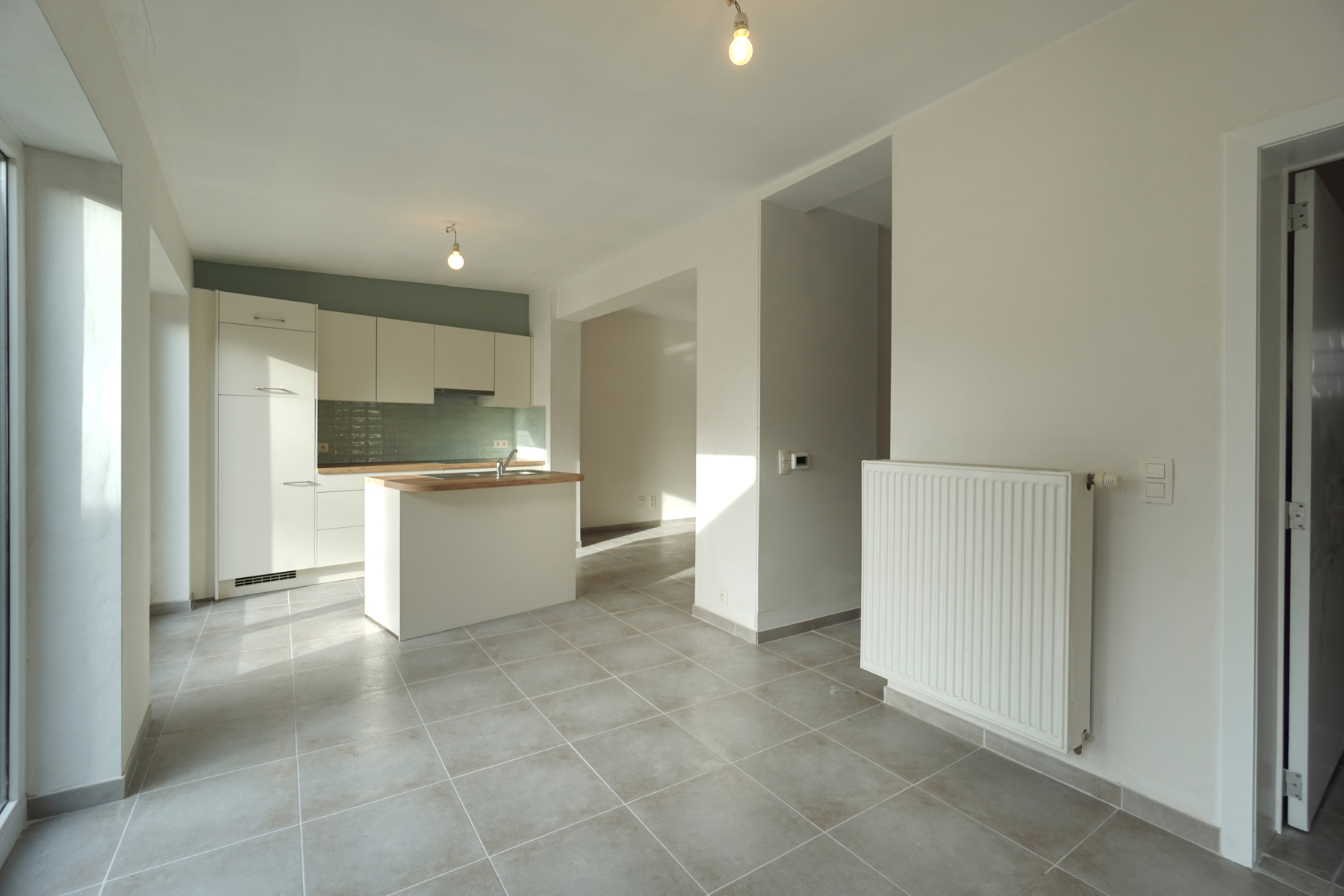 Lichtrijke woning met 2 slaapkamers en zonnige tuin - foto 2