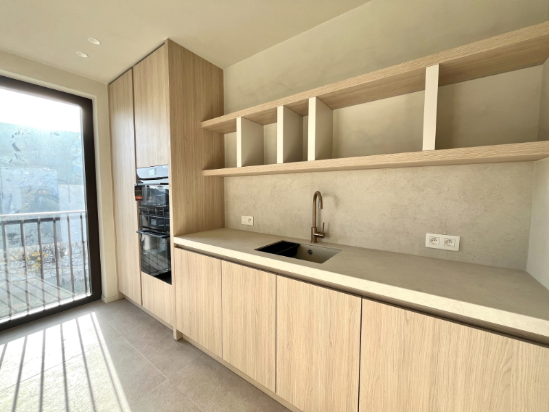 APPARTEMENT MET 2 SLAAPKAMERS, 2 BADKAMERS EN ONDERGRONDSE AUTOSTAANPLAATS TE HUUR IN SLEIDINGE - foto 1