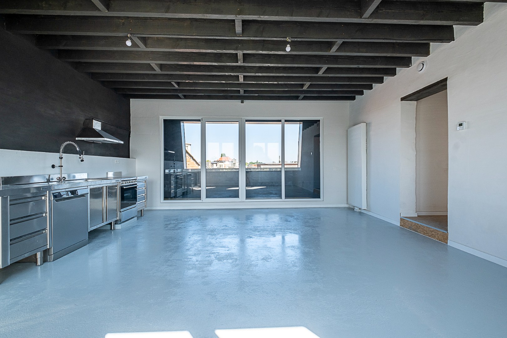 Genieten op hoogte: lichtrijk dakappartement met terras - foto 4