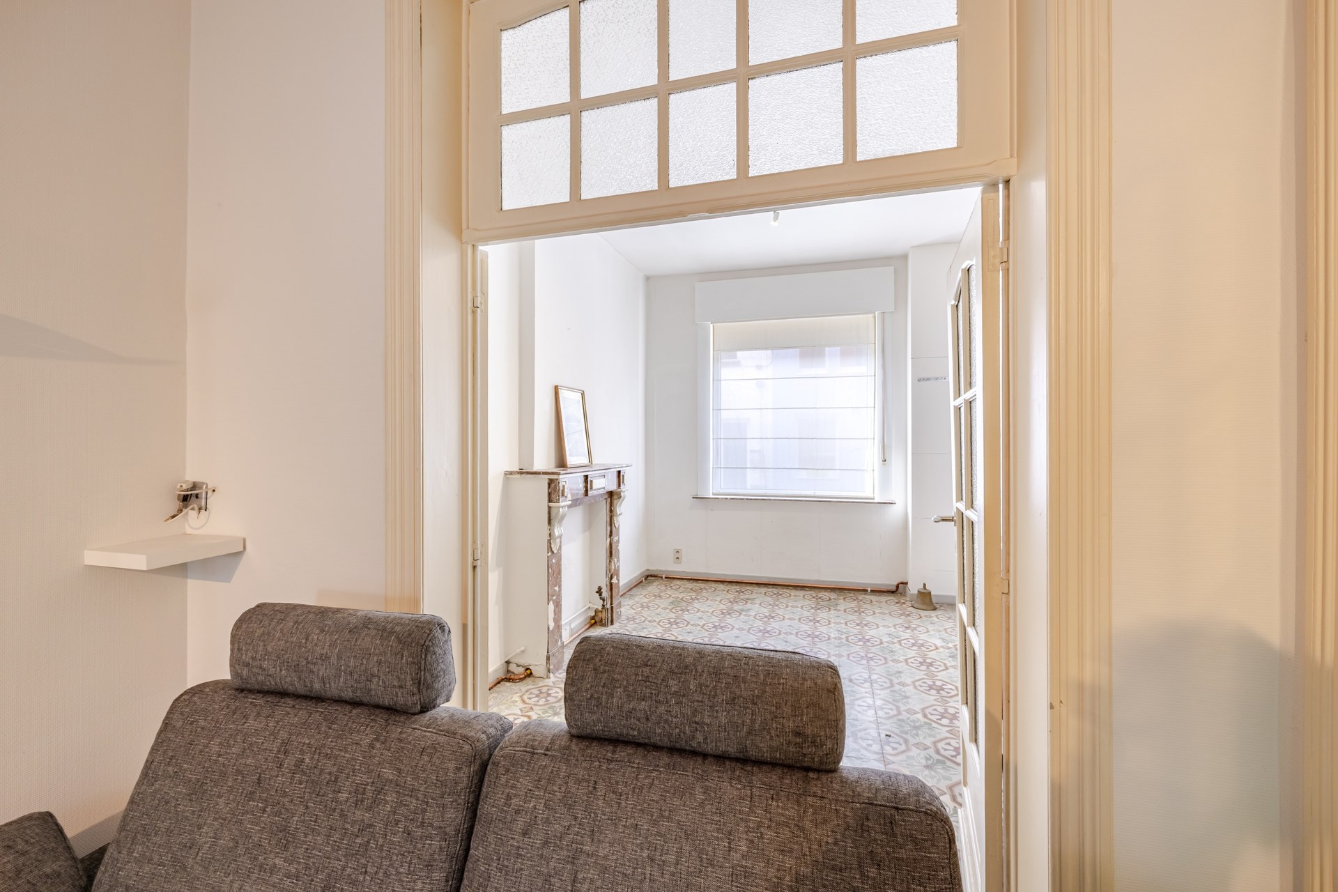 Een ruime en veelzijdige stadswoning met tuin - foto 4