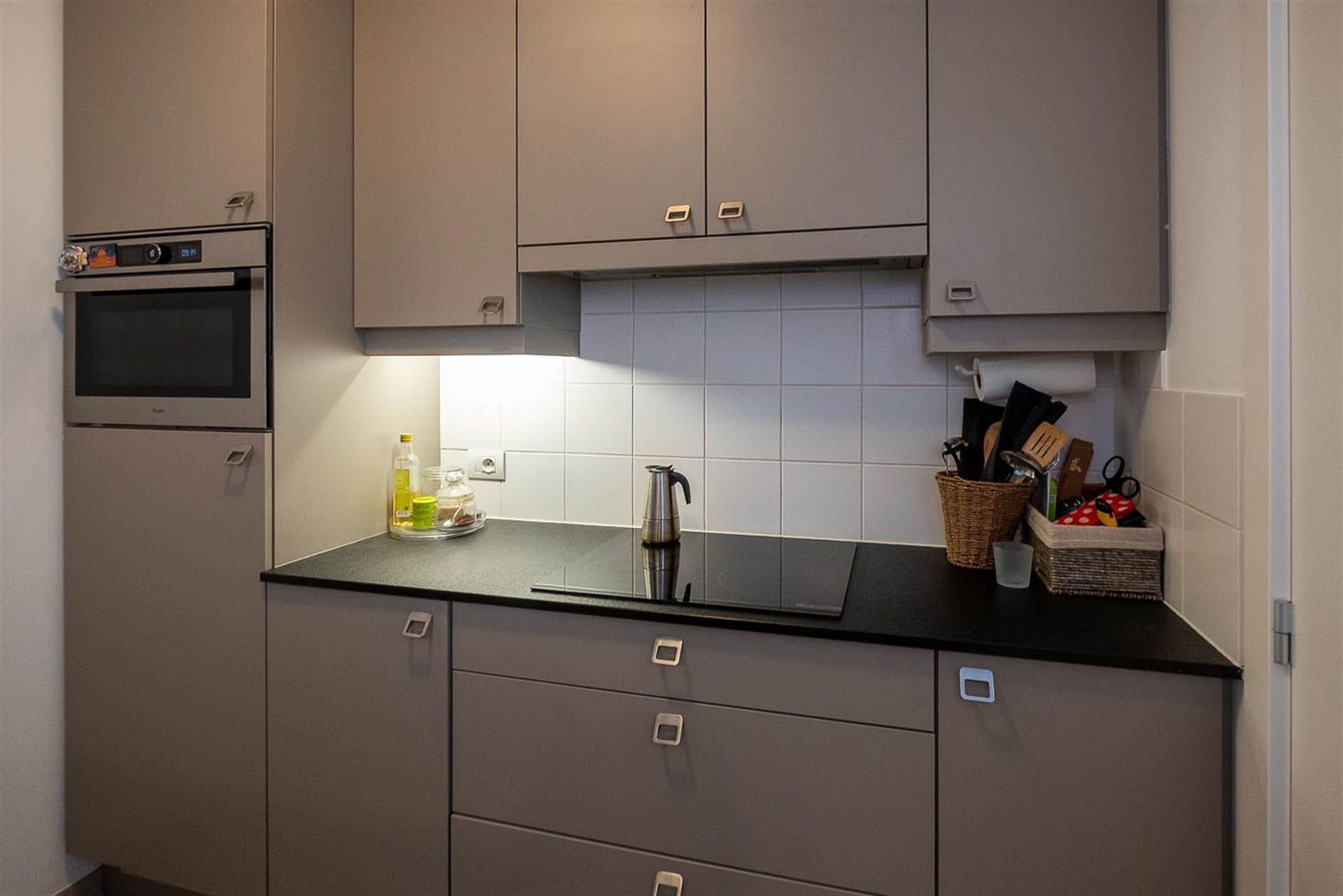 Recent appartement met 1 slaapkamer, autostaanplaats en zeer grote kelderberging - foto 5