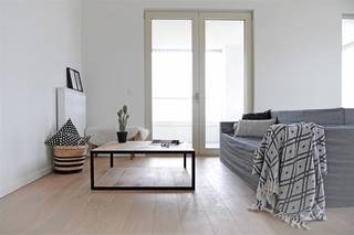 Wonen op hoogte met zicht op water en stad? Dit instapklare 1-slaapkamer appartement (63 m²) op de 11de verdieping van de iconische...