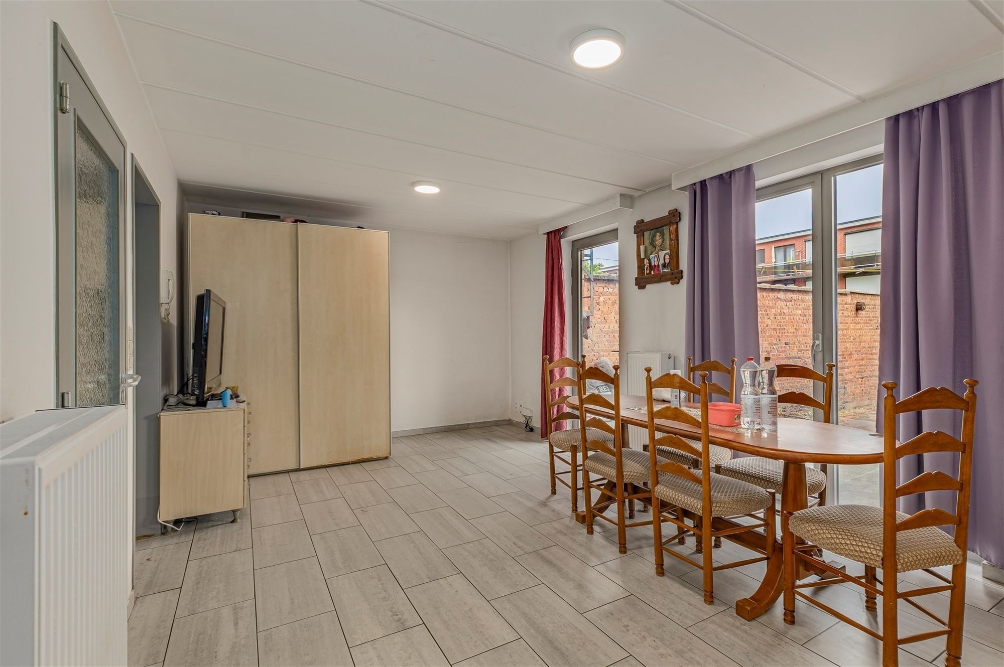 Lichtrijk 1-slaapkamer appartement met tuin en garagebox te koop in Merksem - foto 4