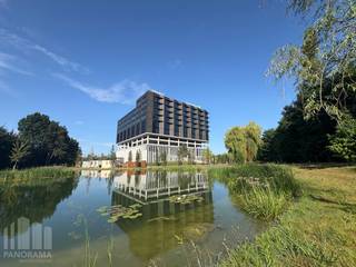 Phenomenally located newly built offices with a surface area of 1,305 m² and excellent visibility along the busy Kortrijksesteenweg. Thanks to its location only 600 metres from the E40 exit Sint-Denijs-Westrem, this is an ideal location for companies that value accessibility and visibility.<br /><br />The office space is particularly bright and designed as a modern landscape office. It is located in a brand-new, high-quality office complex with BREEAM-excellent certification. Surrounded by greenery, this complex also offers additional facilities that significantly enhance working comfort: ample parking, electric car charging stations, dining options and relaxation areas. The offices are finished to a high standard and equipped with all modern comforts, making this space ideal for companies that value a contemporary, inspiring working environment.<br /><br />Different surface options available, ranging from 700 sqm to 9,962 sqm.<br />For more information, detailed plans, or to book a no-obligation site visit, please feel free to contact PANORAMA B2B GENT KANTOREN on 0477 44 39 30.<br /><br /> 