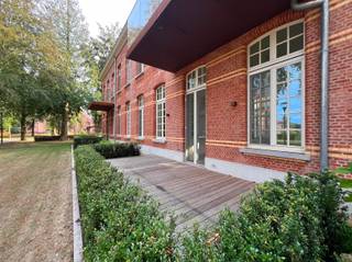 <p><span>Nestled in the heart of the beautiful Groot Park, surrounded by centuries-old trees and greenery, where peace and quiet reign, and just a stone’s throw from Leuven, we are pleased to offer this energy-efficient apartment for sale. </span></p><p><span> </span></p><p><span>This redeveloped historic site was transformed by the renowned developer Virix into an exclusive residential community with a strong focus on heritage, green spaces, and quality of life. </span></p><p><span> </span></p><p><span>This luxurious apartment, with a living area of 96 m², is located on the second floor of the charming pavilion named Sint Vincentius, which was completed in 2025. The apartment features an entryway with a coat closet and guest restroom, a bright living room with an open, fully equipped kitchen, a practical storage room, an open-concept home office, and a bedroom with an en suite bathroom. </span></p><p><span> </span></p><p><span>A highlight not to be missed is the pleasant 8 m² east-facing terrace, which overlooks the beautiful park and offers a daily oasis of tranquility.</span></p><p><span> </span></p><p><span>You’ll also enjoy an exceptional range of communal facilities, including the wellness center with a 16-meter-long heated pool, a sauna, and a fully equipped fitness room—all exclusively accessible to residents. In addition, bicycle storage is included in the price, and there is the option to purchase a parking space and/or a basement unit.</span></p><p><span> </span></p><p><span>In short, this apartment offers a rare combination of contemporary living comfort in a historic setting. A unique opportunity for those seeking luxurious living, energy efficiency, high-quality architecture, and tranquility, without compromising on accessibility and proximity to Leuven.</span></p><p><span> </span></p><p><span>This apartment is being offered fully finished, including flooring and paintwork. Sale subject to registration fees. </span></p><p><span> </span></p>