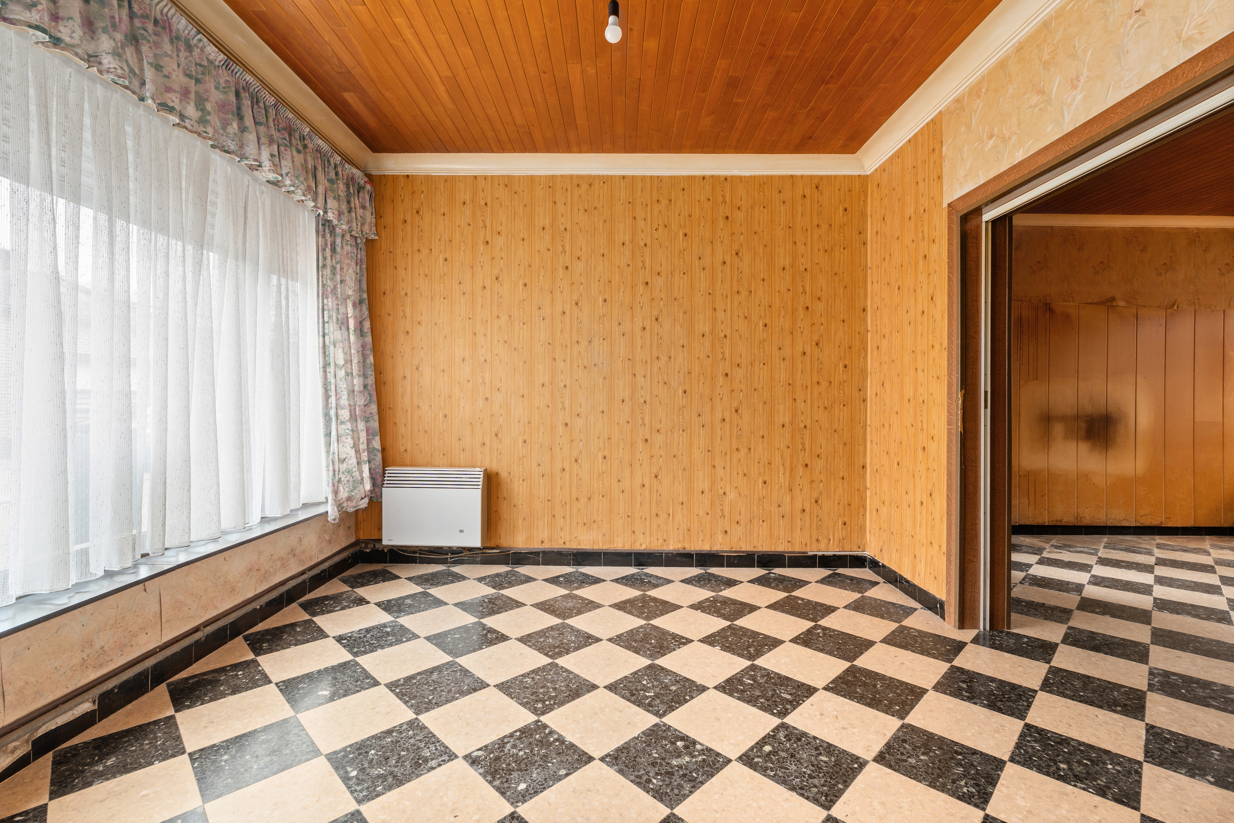 Halfopen woning te koop met tuin en garage in Buggenhout - foto 4