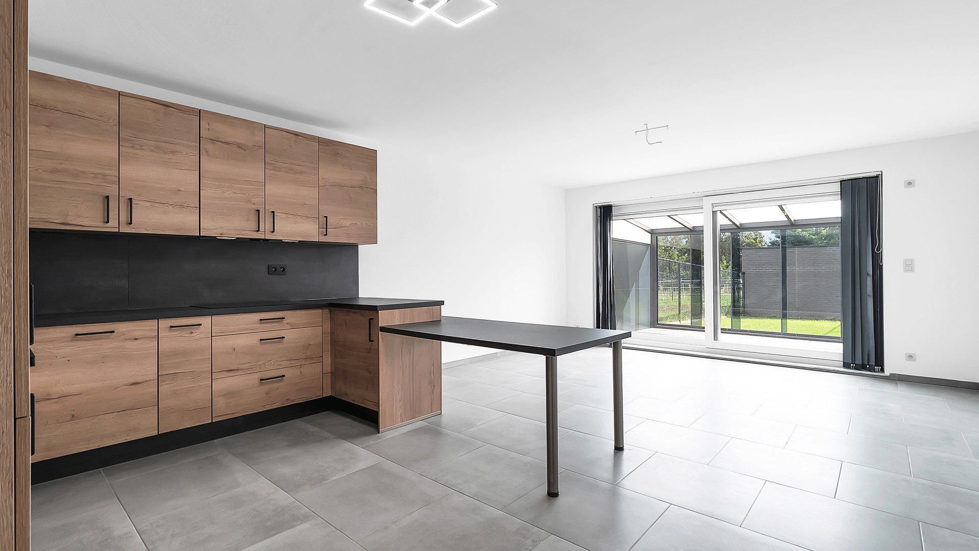 Gelijkvloers appartement met privatieve tuin, volledige onderkelderd en uitzonderlijk gunstig EPC - foto 3