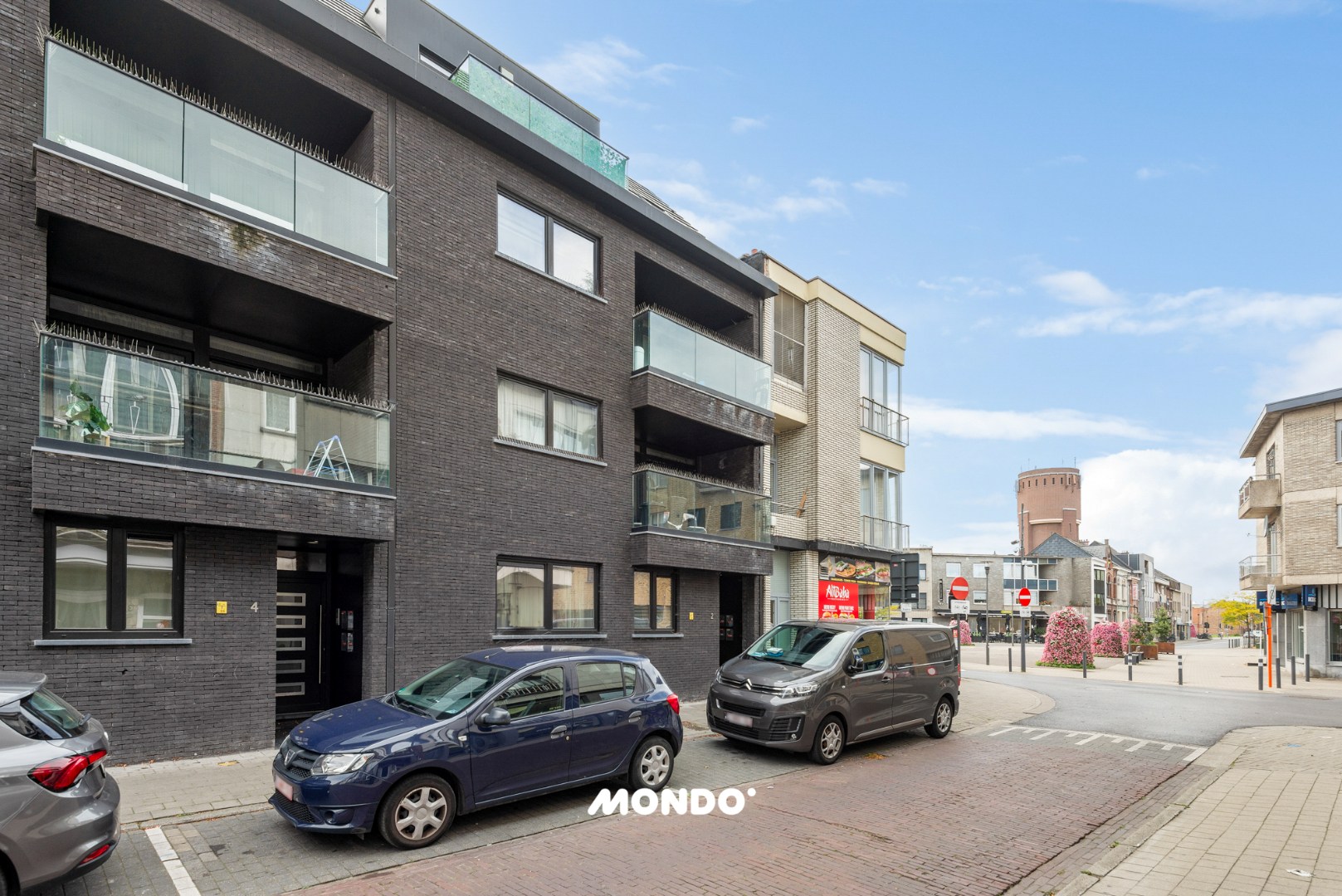 Ruim gelijkvloers appartement met 2 slaapkamers en ruim terras! - foto 1