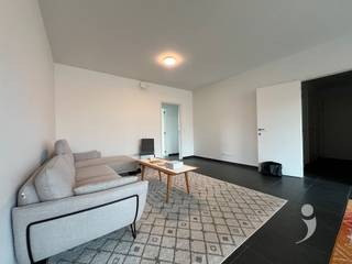 Spacious 2-bedroom apartment in the center of LeuvenThis spacious and pleasant apartment is located in the center of Leuven, within walking distance of numerous shops, restaurants, cafés, and other amenities. Thanks to its central location, you enjoy everything Leuven has to offer, while the E314 motorway is also accessible within approximately 5 minutes by car.The apartment features two spacious bedrooms and also offers a comfortable bathroom with a bathtub and double sink, as well as a separate shower room. The spacious living area connects to an open kitchen equipped with an oven, refrigerator, and freezer. From the living area, you have access to a cozy terrace overlooking a lovely square, a nice place to relax.Additionally, the apartment includes an underground parking space, which is a great extra asset in the center of Leuven. There is also a practical storage room near the parking area, ideal for storing bicycles, equipment, or other items. Furthermore, there is a bicycle storage area with space for two bicycles.An ideal apartment for those looking for space, comfort, and a central location in Leuven.Interested? Request your visit today through our website.