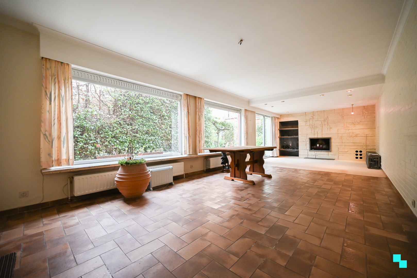 Centraal gelegen handelsruimte met bijhorende woonst en leuke stadstuin te Izegem - foto 5