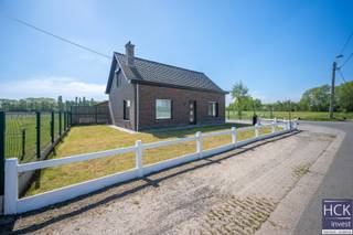 De liggingUitermate rustig gelegen woning met rondom groenzichten, doch op amper 15 min. rijden van centrumstad Gent. De woning geniet een optimale...