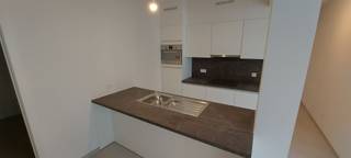 Moderne instapklaar gelijkvloers appartement met 2 slaapkamers en privé buitenruimte in Maasmechelen Deze woning overtuigt met een strakke,...