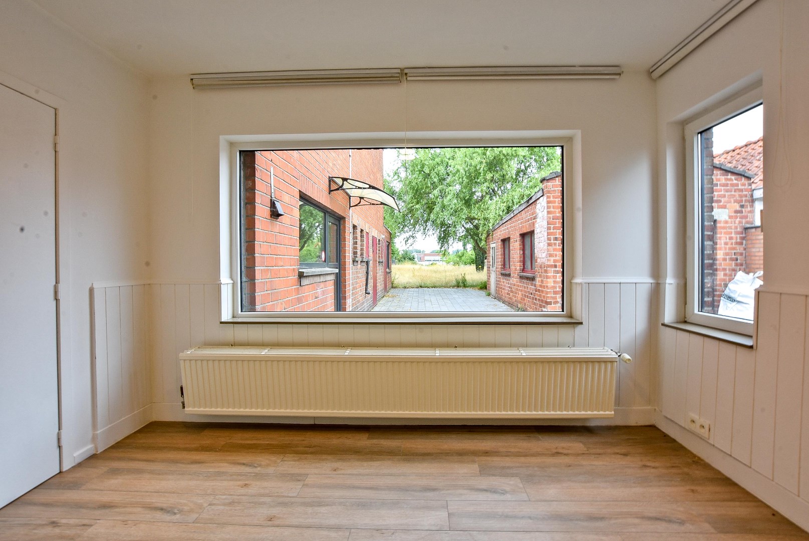 Halfopen bebouwing met mogelijkheid tot 7 slaapkamers, 2 badkamers en grote tuin in Aalter - foto 5