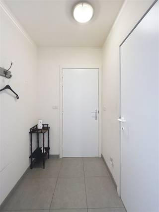 Recent gelijkvloers appartement met garage in centrum LangemarkHet appartement is ingedeeld als volgt:inkomhal met gastentoilet, ruime leefruimte met...