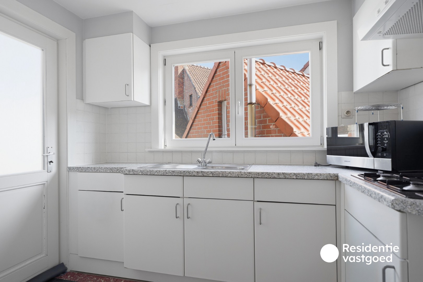 Charmante stadswoning met garage en 2 slaapkamers - foto 4