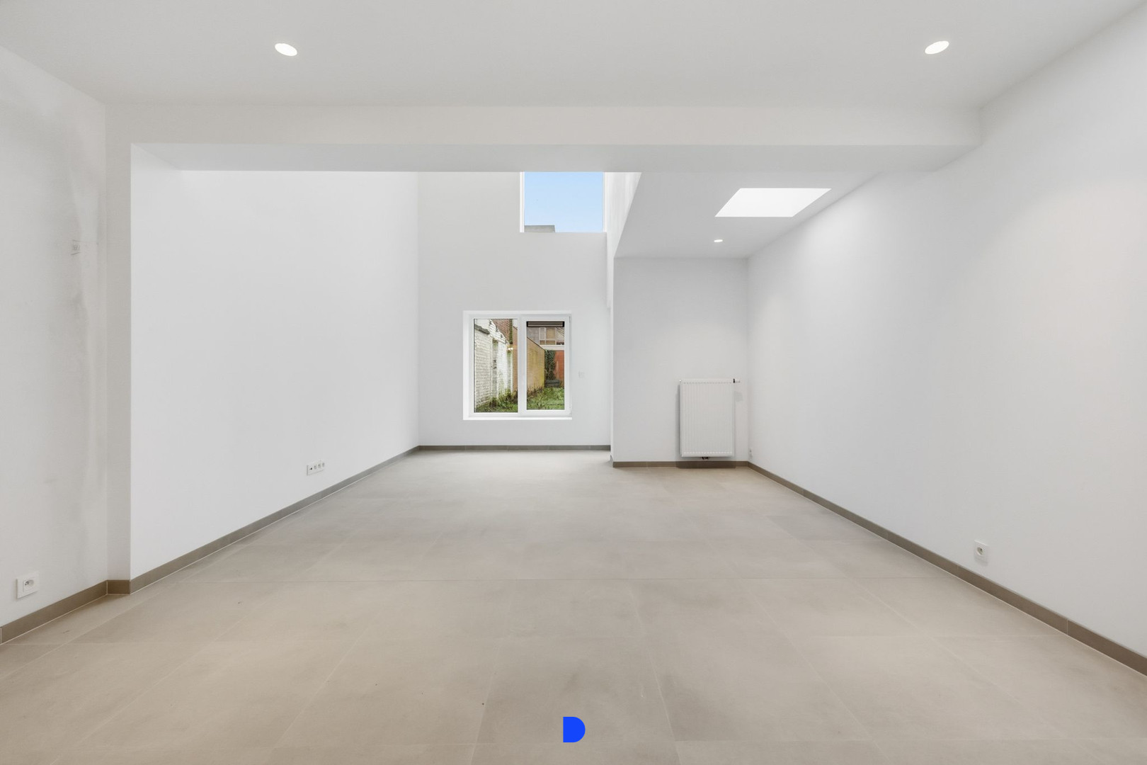 Stijlvol gerenoveerde woning met lichtrijke leefruimtes en tuin - foto 4