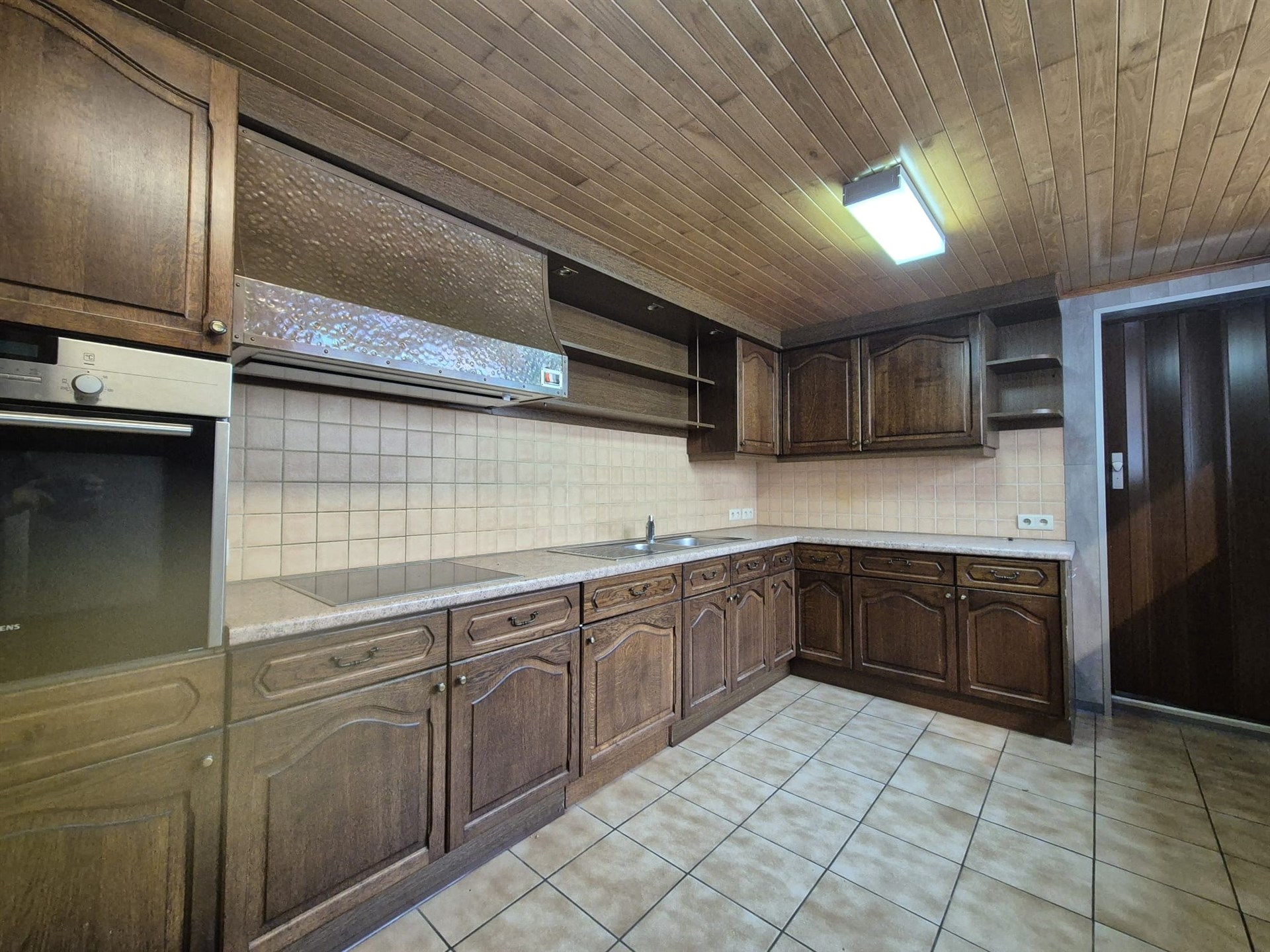 Ruime en instapklare woning met grote tuin en garage. - foto 5