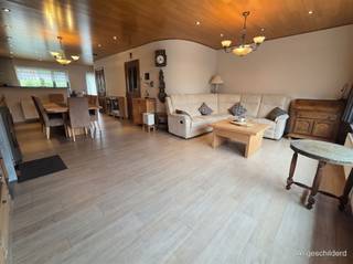 Through the entrance hall with guest toilet we enter on the 1st floor the renovated spacious living room with open kitchen fully equipped with...