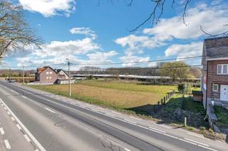 <p>Voor meer informatie of een bezoek, bel 02/532.22.57 - Lennik (Eizeringen): Op een strategische ligging langs de Assesteenweg en op een boogscheut van de belangrijke as Brussel-Ninove en Asse-Edingen, biedt Topo-Immo u deze <strong>prachtige bouwgrond</strong> aan met een een oppervlakte van <strong>8a 19ca</strong>. Geschikt voor het oprichten van een <strong>open bebouwing</strong>! Mogelijkheid om een gedeelte te voorzien met <strong>kantoorfunctie, vrij beroep, handel, dienstverlening en ambacht</strong>. Het perceel is 18m breed. De <strong>maximale</strong> <strong>gevelbreedte </strong>bedraagt<strong> 12m</strong>. Maximale bouwdiepte: 15m op het gelijkvloers en 12m op de verdieping. Kroonlijsthoogte: hellend dak tussen 3,20m en 6,20m - plat dak max. 6,50m. <strong>Mogelijkheid tot het oprichten van een vrijstaand tuinhuis, serre, poolhouse of terrasoverkapping in de achtertuin! </strong>Winkels, scholen en openbaar vervoer bevinden zich in de nabijheid. Interesse in deze mooie bouwgrond? Neem dan snel contact op met ons om het dossier in te kijken op kantoor! (Prijs exclusief opmetingskosten, aandeel verkavelingsakte en aansluitingskosten). Maatregelen opgenomen in het maatregelenregister: nee. Deze prijs is een vanaf-prijs.<strong> Deze prijs is een vanaf-prijs. </strong></p>