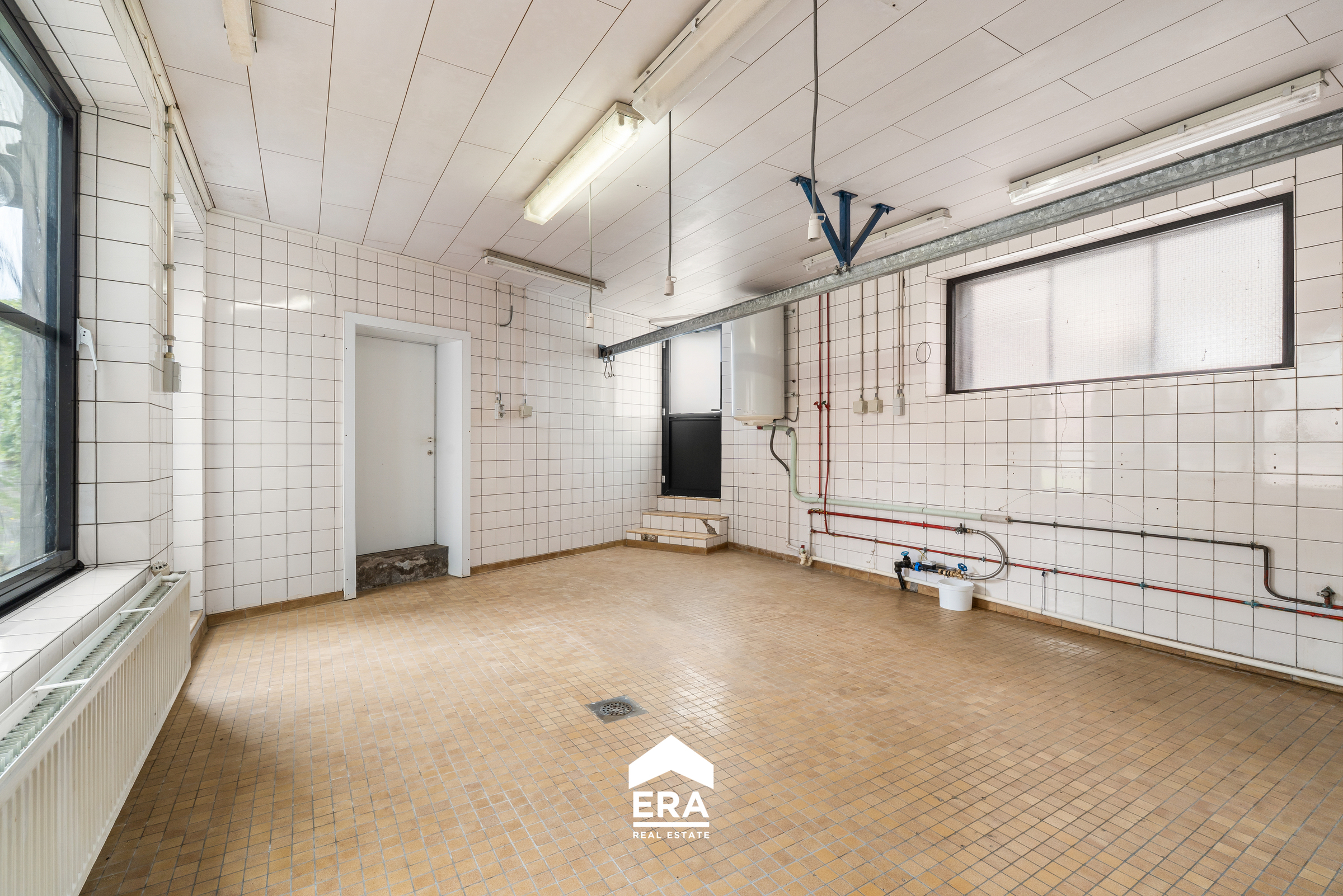 Handelszaak met woonst op toplocatie centrum Zomergem! - foto 3