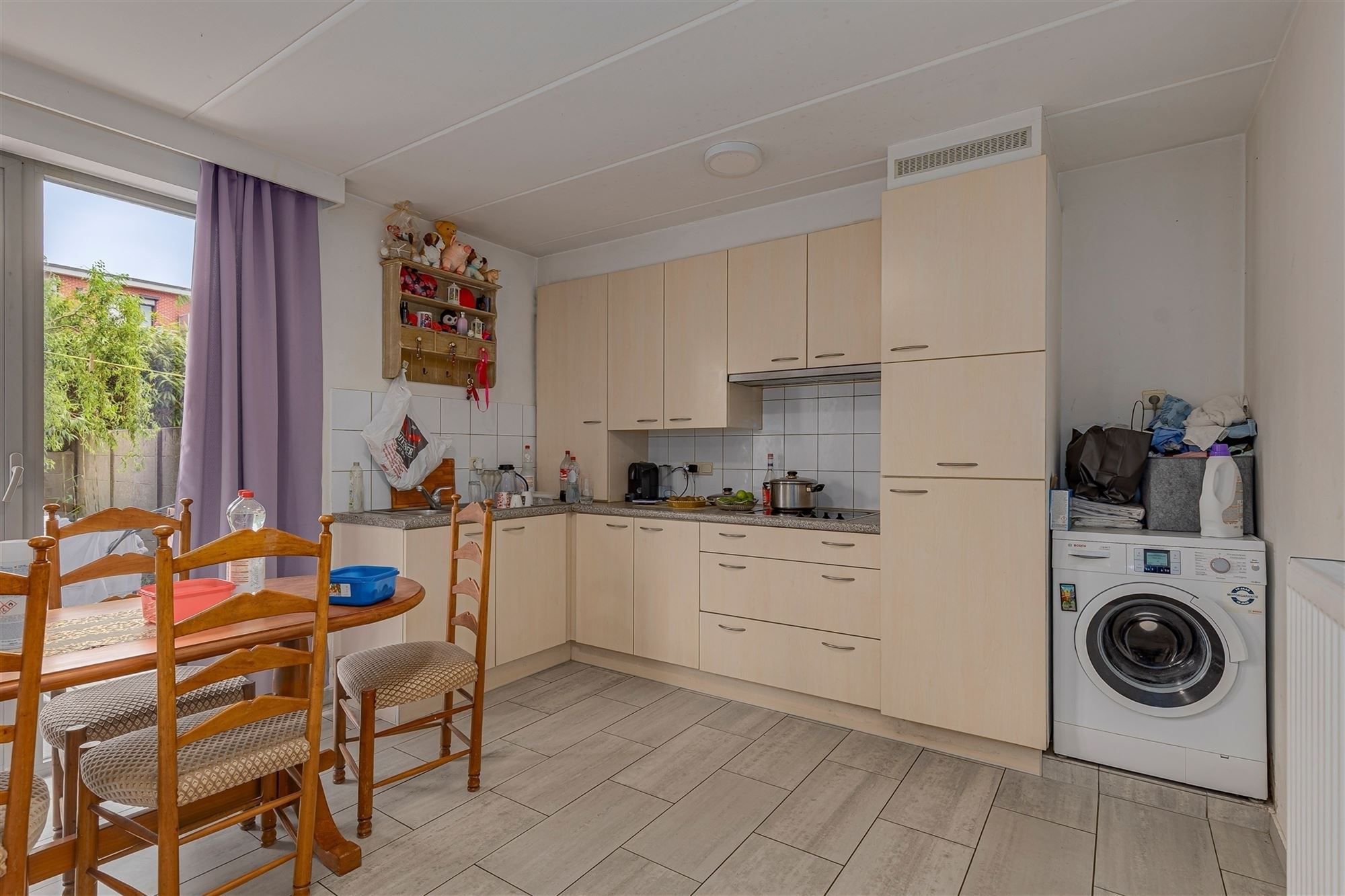 Lichtrijk 1-slaapkamer appartement met tuin en garagebox te koop in Merksem - foto 5