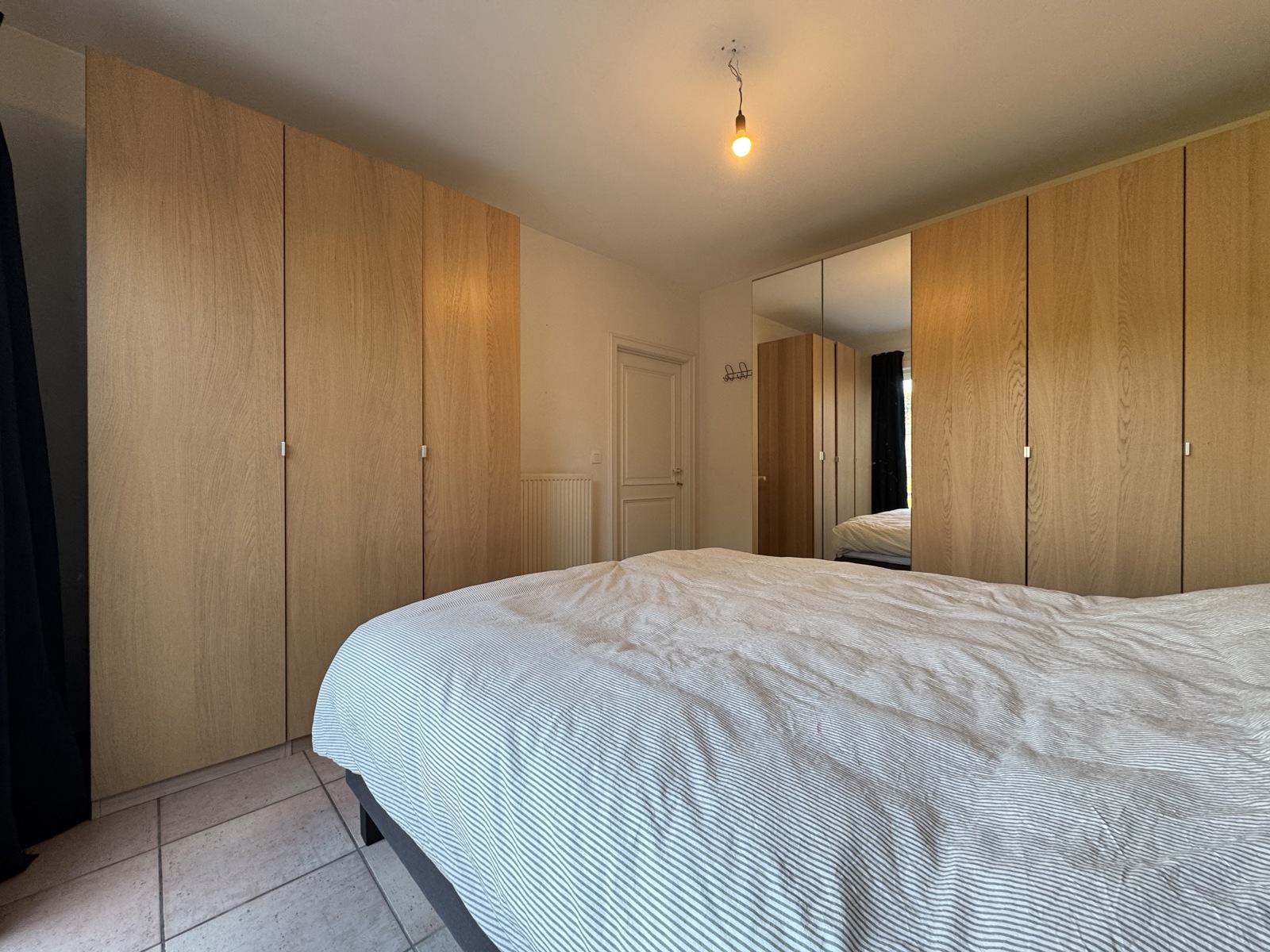 Gelijkvloers appartement met ruime privé tuin en garage - foto 5