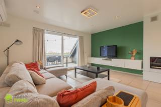 Ruim en stijlvol duplex appartement (155m²) met garage en staanplaats te Schoonaarde (Dendermonde) | BEZOEKDAG 11/04 op afspraak Dit ruim en...