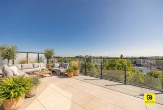 <p><span>Luxurious and high quality new construction apartment in strategic location</span></p><p><span>Located in a privileged location with in short proximity several green parks ( park Den Brandt and Middelheim park), educational institutions of all educational levels, stores, recreational facilities, good connections to public transport and highways for easy mobility in and around Wilrijk.</span></p><p><span> </span></p><p><span>The newly built apartment has the following layout:</span></p><p><span> </span></p><p><span>Entrance hall:</span></p><p><span>You enter the apartment through a spacious entrance hall equipped with a fitted wardrobe and a separate toilet with hand-washer.</span></p><p><span> </span></p><p><span>Living space & kitchen:</span></p><p><span>The sumptuous living space (43m²) on parquet is bathed in natural light thanks to the large windows and is perfect for relaxation and entertainment. Through the sliding windows on the living space you have access to the terraces on both sides of the apartment (31.6m² and 14.4m²) where you can enjoy from sunrise to sunset.</span></p><p><span>The fully equipped kitchen enjoys every comfort and is a masterpiece of functionality. Adjacent, you have a separate storage room, equipped with custom cabinets and space for the washer and dryer.</span></p><p><span> </span></p><p><span>Bedrooms & bathroom:</span></p><p><span>The apartment has 2 bedrooms both equipped with fitted wardrobes. Each room has ensuite bathroom with a walk-in shower and sink unit.</span></p><p><span> </span></p><p><span>Bicycle storage, basement and garage box:</span></p><p><span>Underground is a communal bicycle storage area. In addition, you have the option to purchase a private cellar storage room from 4,500€ and an enclosed garage box for 27,500€.</span></p><p><span> </span></p><p><span>In addition, you enjoy a reduced VAT rate of 6% here, provided you meet the specified conditions. *</span><span> </span></p><p><span>VAT rate applicable to new construction</span></p><p><span> </span></p><p><span>Additional assets:</span></p><p><span>- High quality new construction apartment </span></p><p><span>- Favourable EPC A</span></p><p><span>- Strategic location </span></p><p><span>- Front and rear terraces</span></p><p><span>- Bicycle storage</span></p><p><span> </span></p>