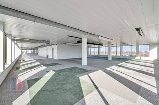 This 635 sqm office space is located on the first floor and is part of the high-quality ‘Atmos’ office complex, consisting of five BREEAM OUTSTANDING-certified buildings. These offices are ready to move in and are located in a green environment with a car-free courtyard. Thanks to the attention to architecture and functionality, these sustainable offices are the ideal environment for innovation and collaboration in Ghent. The offices are future-oriented and comply with upcoming strict European regulations, such as the EU taxonomy. The complex offers ample underground parking facilities, including charging stations, and a public car park under construction, with completion scheduled for January 2025.<br /><br />The building is strategically located on the R4 ring road around Ghent, just 4 minutes' drive from the E40 on-ramp and exit Sint-Denijs-Westrem and 7 minutes from the E17. Sint-Pieters station is 1.6 km away, which is an 8-minute bike ride or a 22-minute walk. In addition, a tram stop is just 900 metres away. The office building also offers excellent visibility from the R4, contributing to its prominent location.<br />Purchase of the offices is also possible.<br /><br /><br />For more information, the specifications or a no-obligation site visit, please contact PANORAMA B2B GENT KANTOREN on 09 225 09 02.