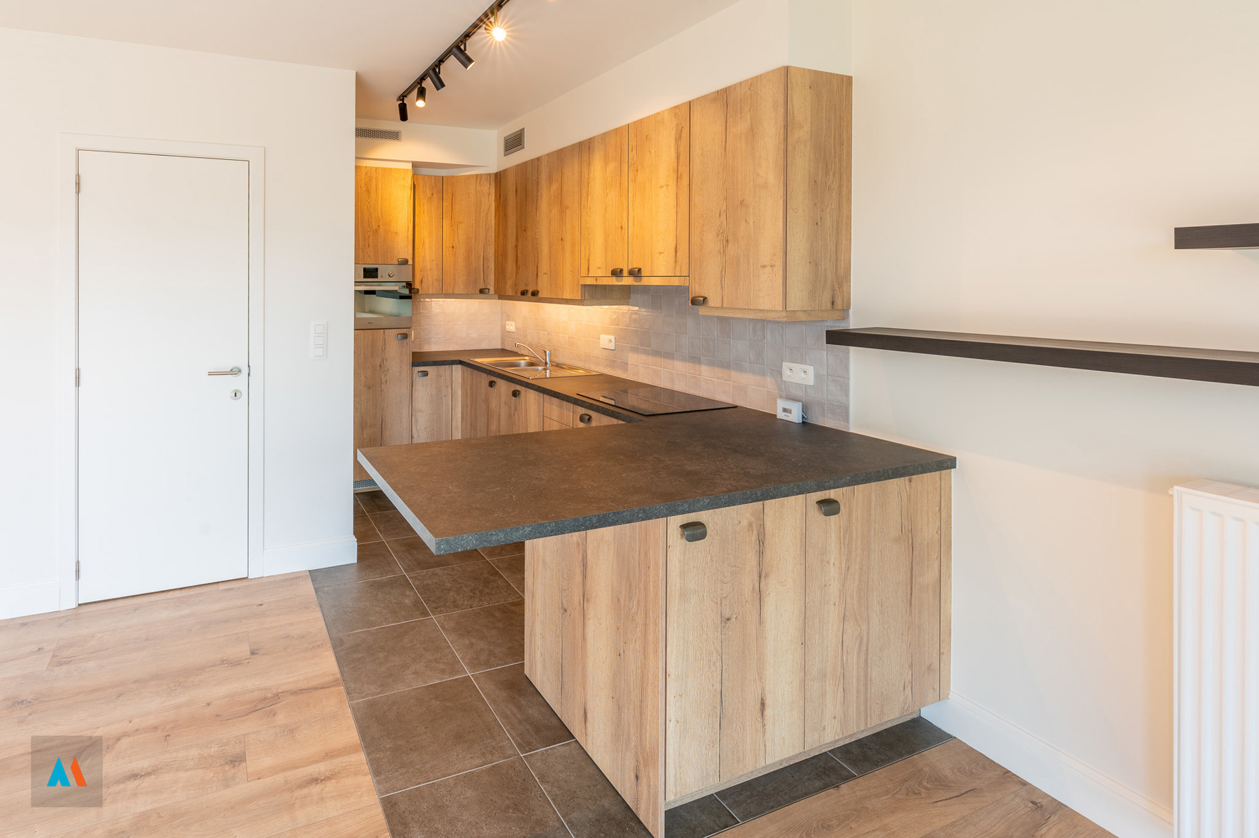 Gelijkvloers appartement met terras en tuintje op het zuiden - foto 5