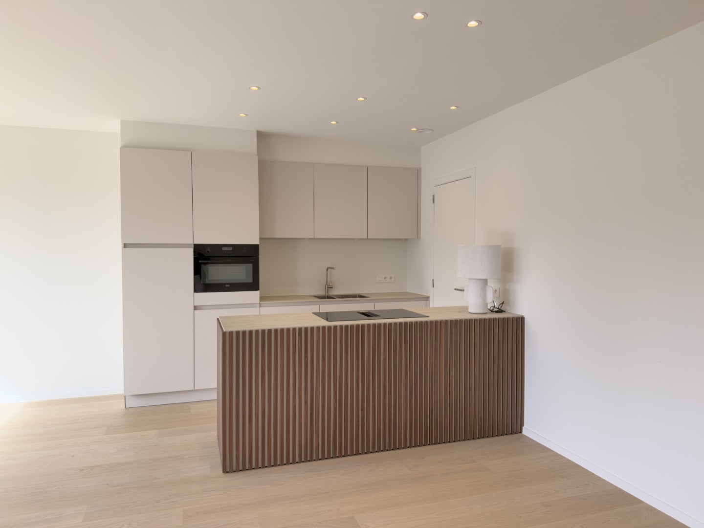 Schitterend nieuwbouwappartement met twee slaapkamers en een Zuidgericht overdekt terras gelegen op de eerste verdieping in de stijlvolle nieuwbouwresidentie "Maurice" vlakbij Duinenwater en het station van Knokke-Heist. - foto 4