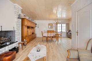 Are you looking for a home that you can completely customize? This semi-detached building in the heart of Kruibeke offers the perfect basis for your dream project. This is a building to be renovated with a solid structure, ideal for those looking for the unique opportunity to fully determine the finish according to their own taste and budget.<br /><br />The location in the Baselstraat is an absolute asset: you are within walking distance in the center, where schools, shops and public transport are easily accessible. <br /><br />With a sunny garden and a spacious garage with an extra floor, this house in Kruibeke has enormous potential. Whether you dream of a modern open kitchen, a spacious master bedroom in the attic or a creative hobby room above the garage, you can make all your wishes come true here. <br /><br />Layout of the property:<br />- Ground floor: Entrance hall, dry cellar, living room, kitchen, bathroom and a veranda with a view of the garden.<br />- First floor: Night hall and 3 full bedrooms.<br />- Attic: Very spacious attic with plenty of options for extra rooms.<br /><br />Exterior: Sunny garden, a practical driveway and a large garage with an extra floor.<br /><br />Do you see the potential of this house and would you like to discover this house in Kruibeke for yourself? Contact us today at Dewaele.com<br /><br />This property is subject to the renovation obligation imposed by the Flemish government for residential buildings (unless demolished within 5 years of purchase). For more information, consult the website of the Flemish Energy and Climate Agency at https://www.vlaanderen.be/een-woning-kopen/renovatieverplichting-voor-residentiele-gebouwen<br /><br />Register of measures: no