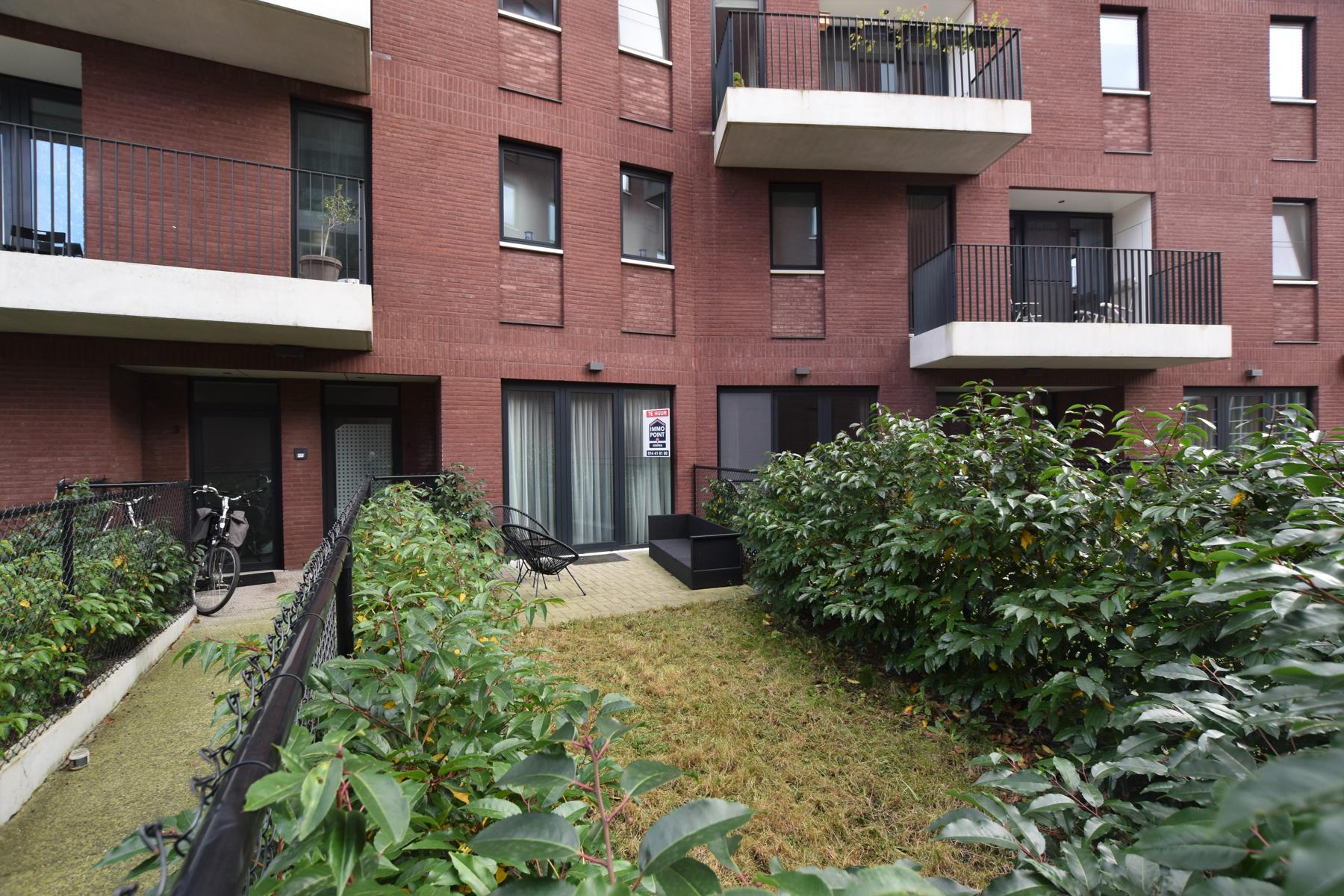 Gelijkvloers 2 slk. app met terras, tuin en ondergronds: P+B - foto 1