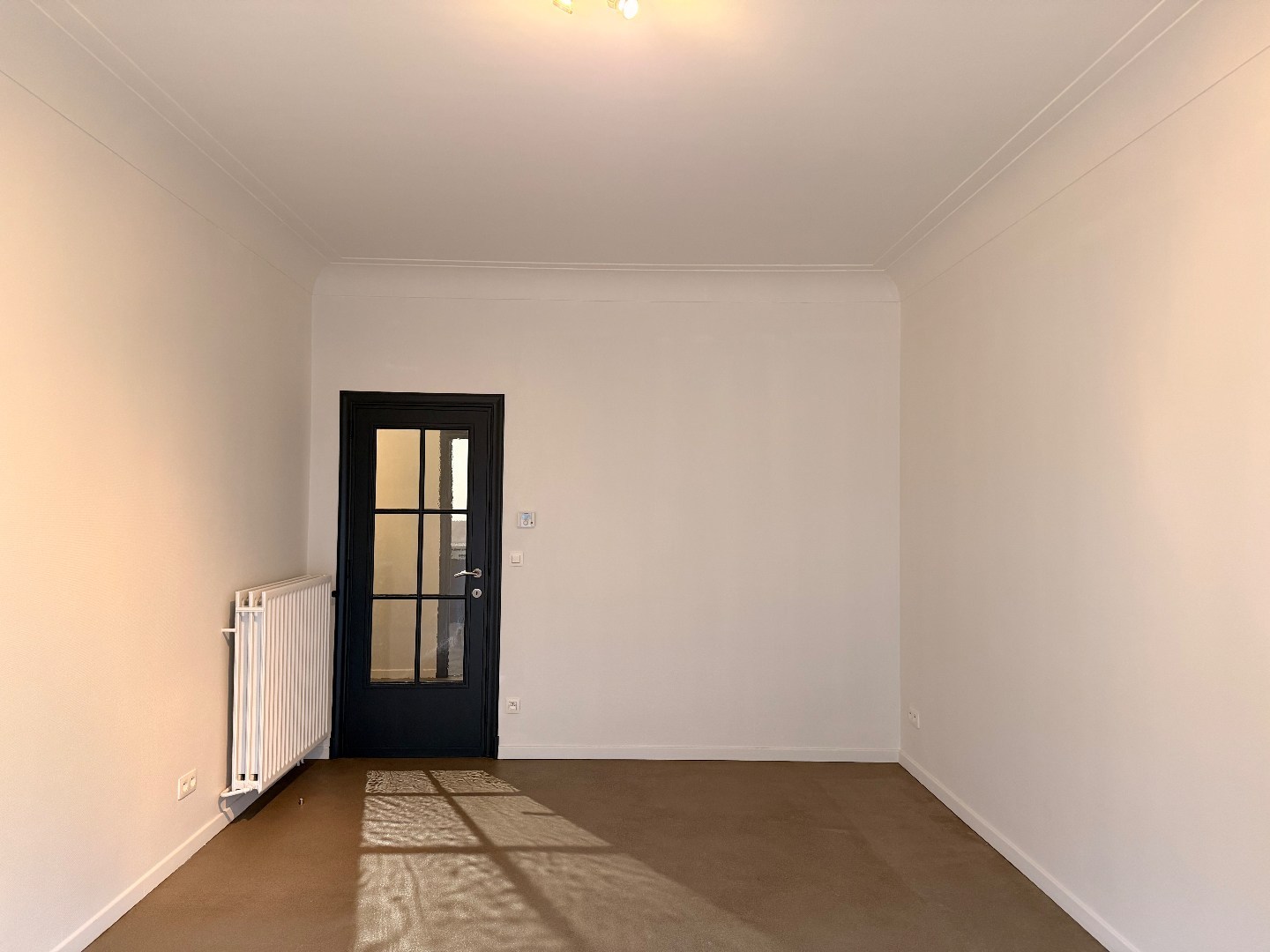 Verzorgd gelijkvloers appartement met tuin, op een rustige ligging te Lier! - foto 3