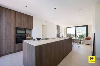 <p><span>Luxurious and high quality new construction apartment in strategic location</span></p><p><span>Located in a privileged location with in short proximity several green parks ( park Den Brandt and Middelheim park), educational institutions of all educational levels, stores, recreational facilities, good connections to public transport and highways for easy mobility in and around Wilrijk.</span></p><p><span> </span></p><p><span>The newly built apartment has the following layout:</span></p><p><span> </span></p><p><span>Entrance hall:</span></p><p><span>You enter the apartment through a spacious entrance hall equipped with a fitted wardrobe and a separate toilet with hand-washer.</span></p><p><span> </span></p><p><span>Living space & kitchen:</span></p><p><span>The sumptuous living space (43m²) on parquet is bathed in natural light thanks to the large windows and is perfect for relaxation and entertainment. Through the sliding windows on the living space you have access to the terraces on both sides of the apartment (31.6m² and 14.4m²) where you can enjoy from sunrise to sunset.</span></p><p><span>The fully equipped kitchen enjoys every comfort and is a masterpiece of functionality. Adjacent, you have a separate storage room, equipped with custom cabinets and space for the washer and dryer.</span></p><p><span> </span></p><p><span>Bedrooms & bathroom:</span></p><p><span>The apartment has 2 bedrooms both equipped with fitted wardrobes. Each room has ensuite bathroom with a walk-in shower and sink unit.</span></p><p><span> </span></p><p><span>Bicycle storage, basement and garage box:</span></p><p><span>Underground is a communal bicycle storage area. In addition, you have the option to purchase a private cellar storage room from 4,500€ and an enclosed garage box for 27,500€.</span></p><p><span> </span></p><p><span>In addition, you enjoy a reduced VAT rate of 6% here, provided you meet the specified conditions. *</span><span> </span></p><p><span>VAT rate applicable to new construction</span></p><p><span> </span></p><p><span>Additional assets:</span></p><p><span>- High quality new construction apartment </span></p><p><span>- Favourable EPC A</span></p><p><span>- Strategic location </span></p><p><span>- Front and rear terraces</span></p><p><span>- Bicycle storage</span></p><p><span> </span></p>