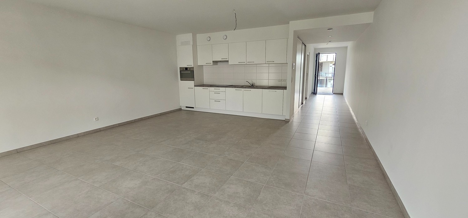 Nieuwbouwappartement met één slaapkamer gelegen in het commercieel centrum van Eisden. - foto 4