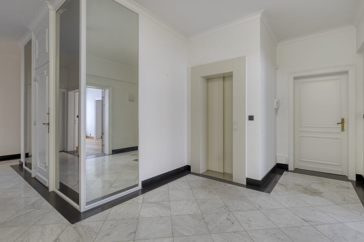 Patrimoniumvennootschap met handelspand en 2 appartementen - foto 5