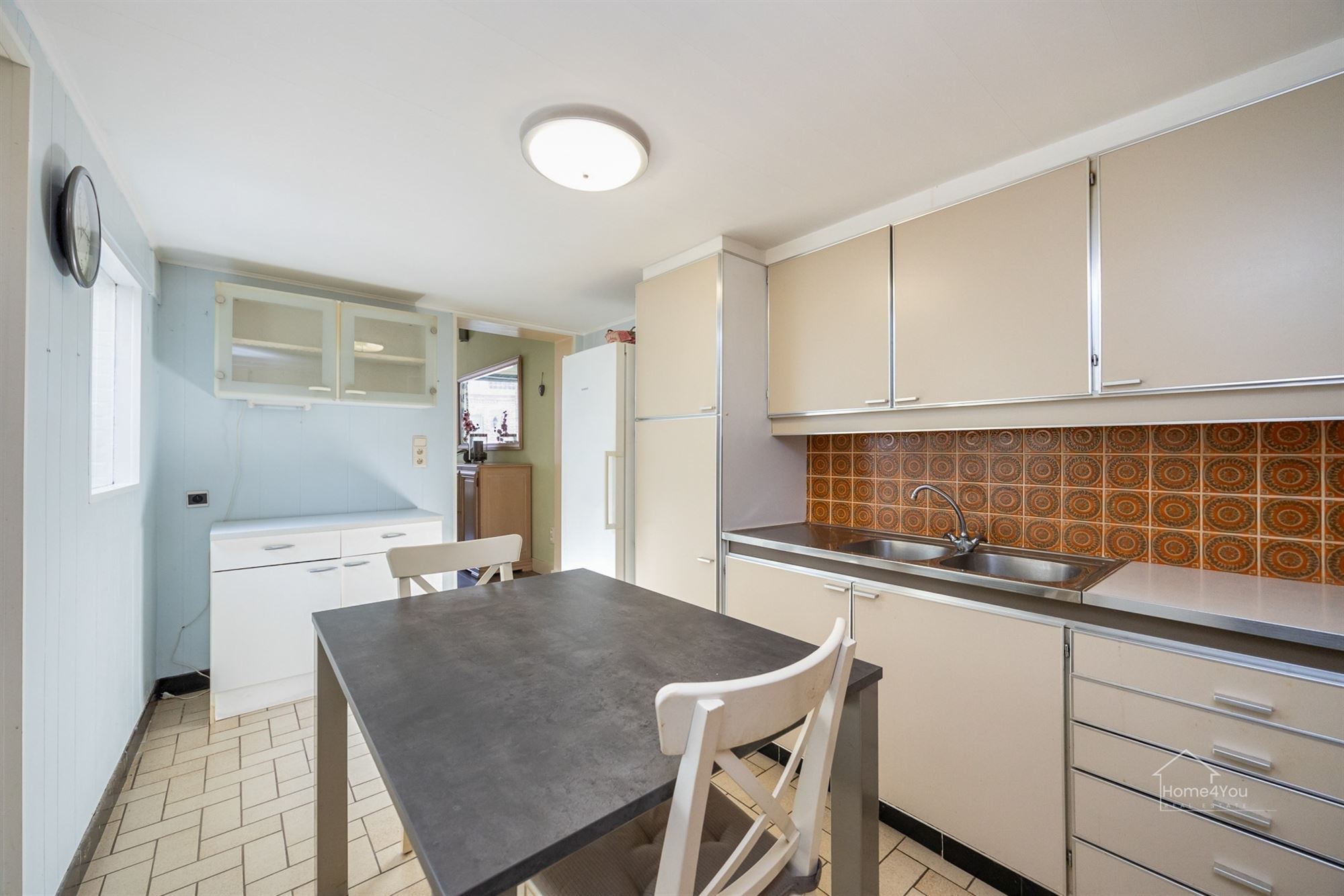 Te renoveren rijwoning met tuintje - foto 5